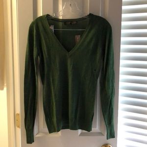 green sweater